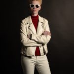 Headshot of Mayia Warren, a person with albinism.