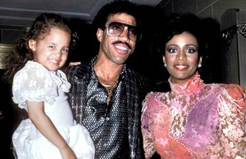 Nicole Richie as a young girl with her adoptive parents Lionel and Brenda Richie