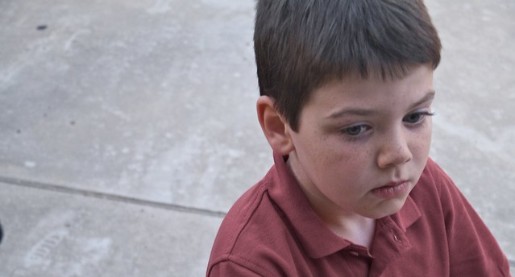 young boy alone