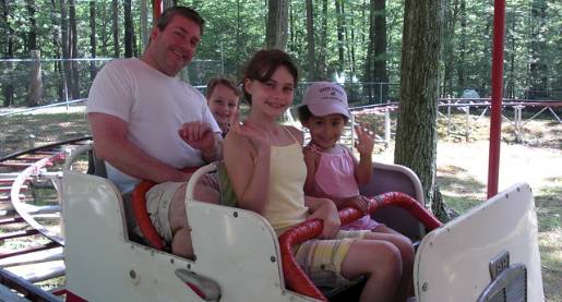 foster family at amusement park
